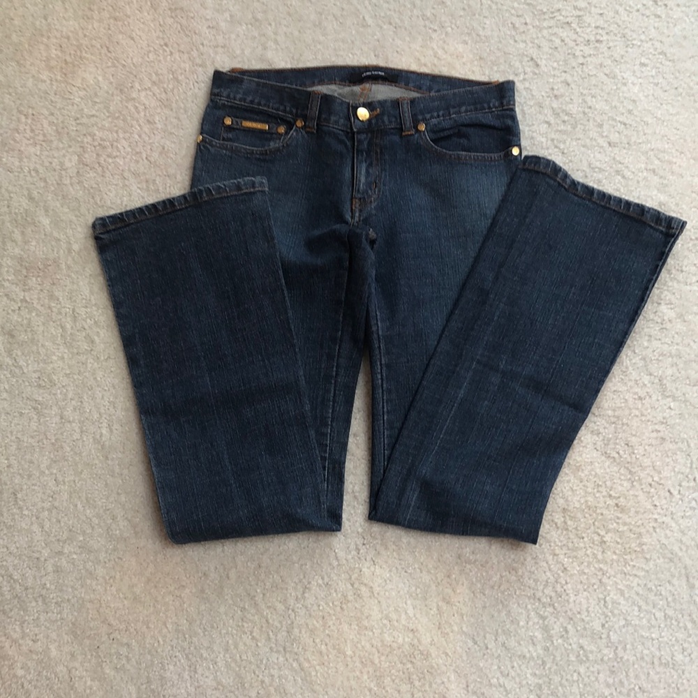 Daisy Fuentes size 2 jeans, boot cut with back pockets embroidered & beaded
